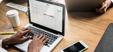 Business people working on laptop - Yourfone
